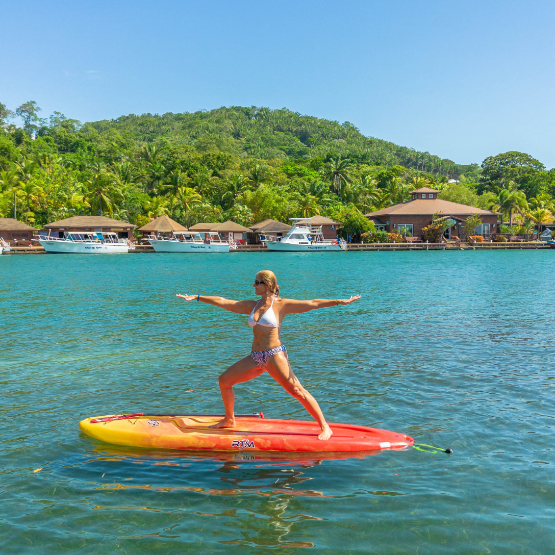 Yoga on Stand-up paddle boards in Roatan at Anthony's Key Resort.