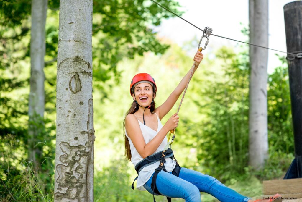 Poconos summer activities woman ziplining