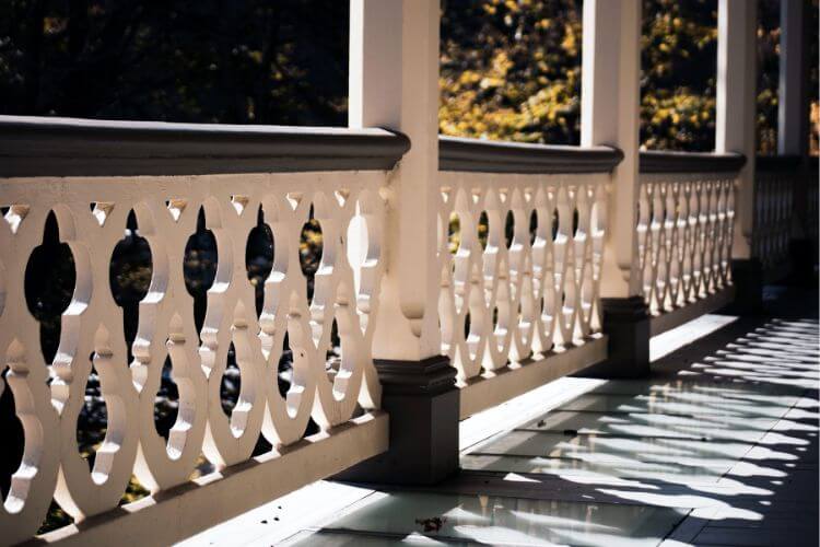 ornate veranda wood railings at asa packer mansion