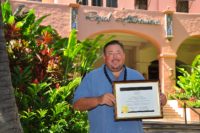 Justin Genzlinger with the Historic Hotels of America award