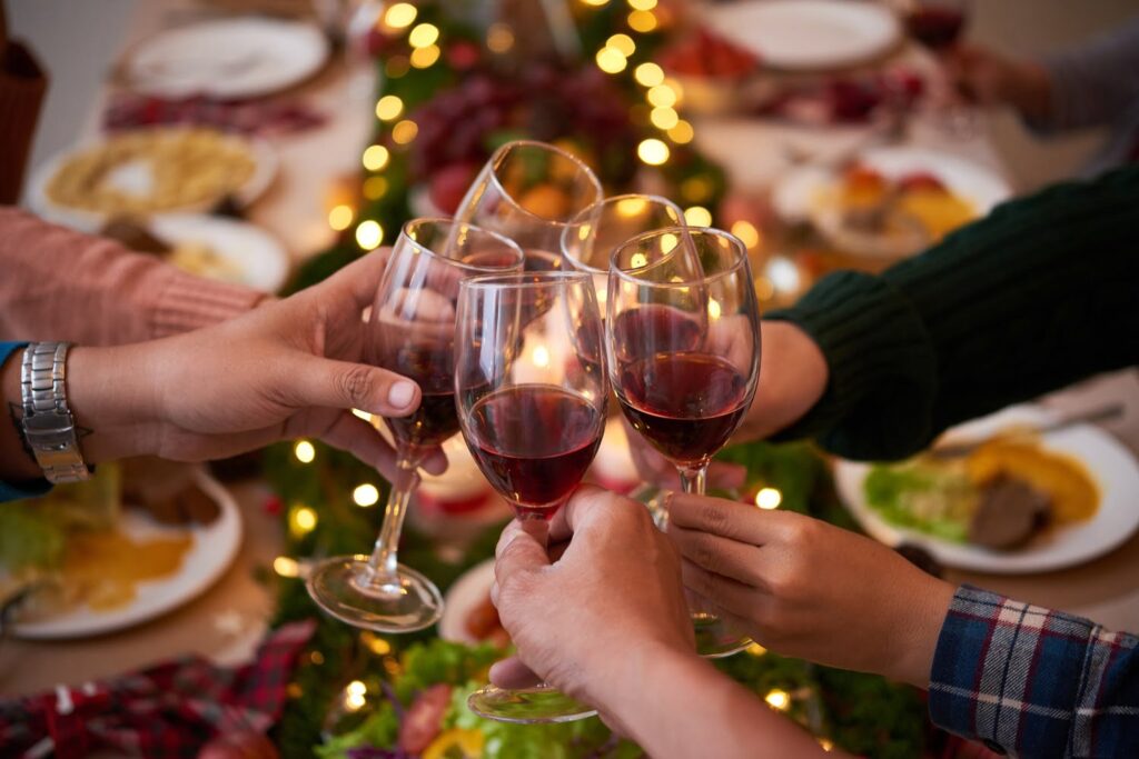 Group of people toasting at a holiday party