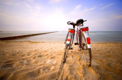 two bicycles at the beach