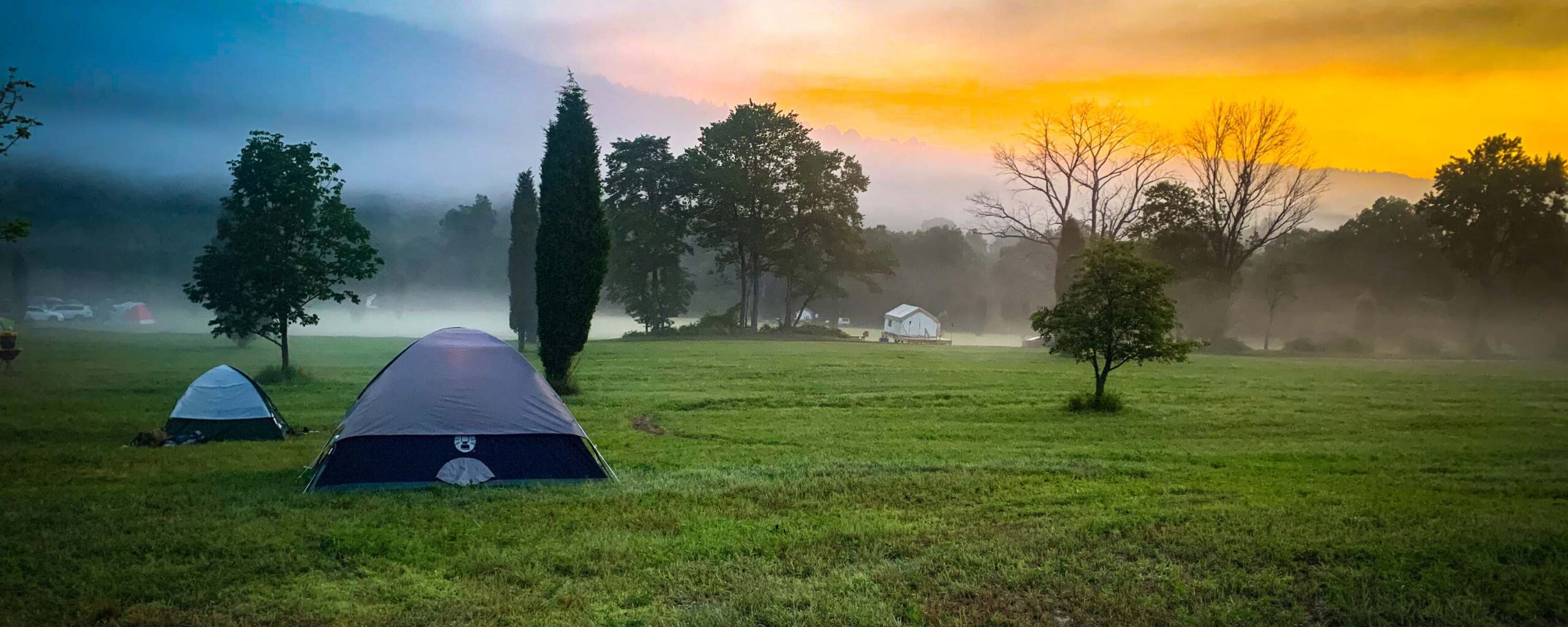 A picture of a tent in a field in the Pocono Mountains