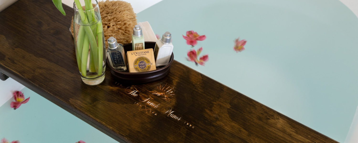 Bathtub with Flowers and Spa Essentials