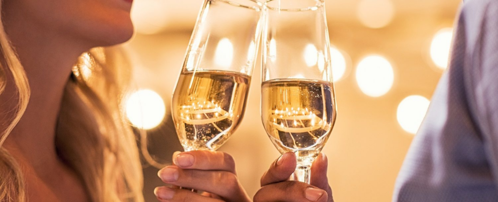 Couple toasting champagne flutes