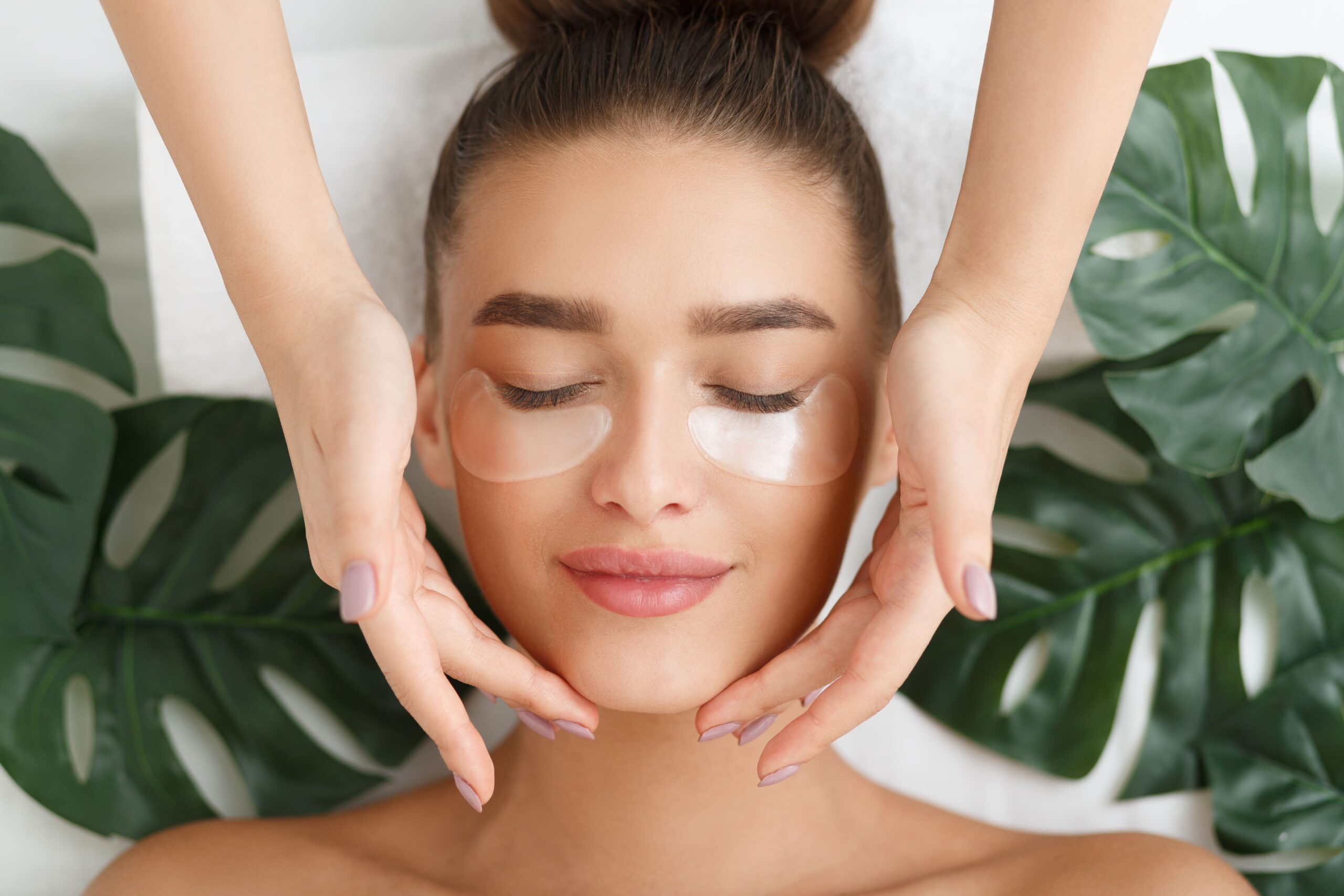 Woman Getting a Relaxing Facial at a Spa