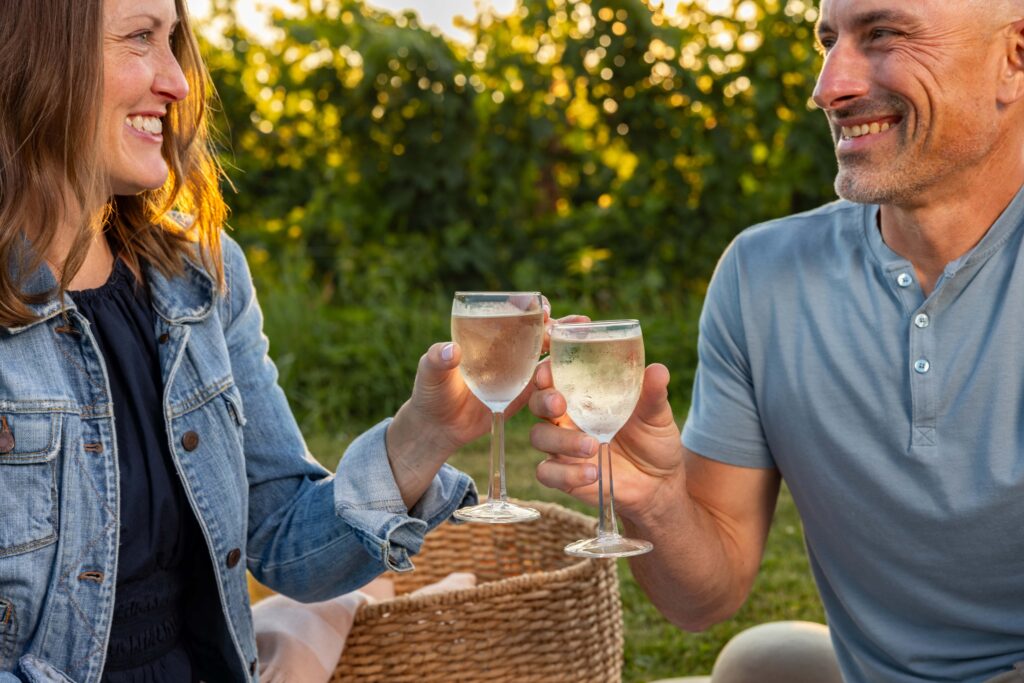 Couple cheering over wine in Ohio Wine Country.