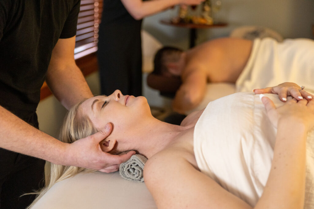a guest getting a massage at the spa