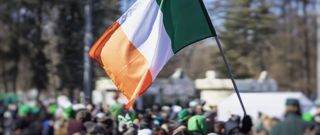 Irish flag waving at a St. Patrick's Day parade