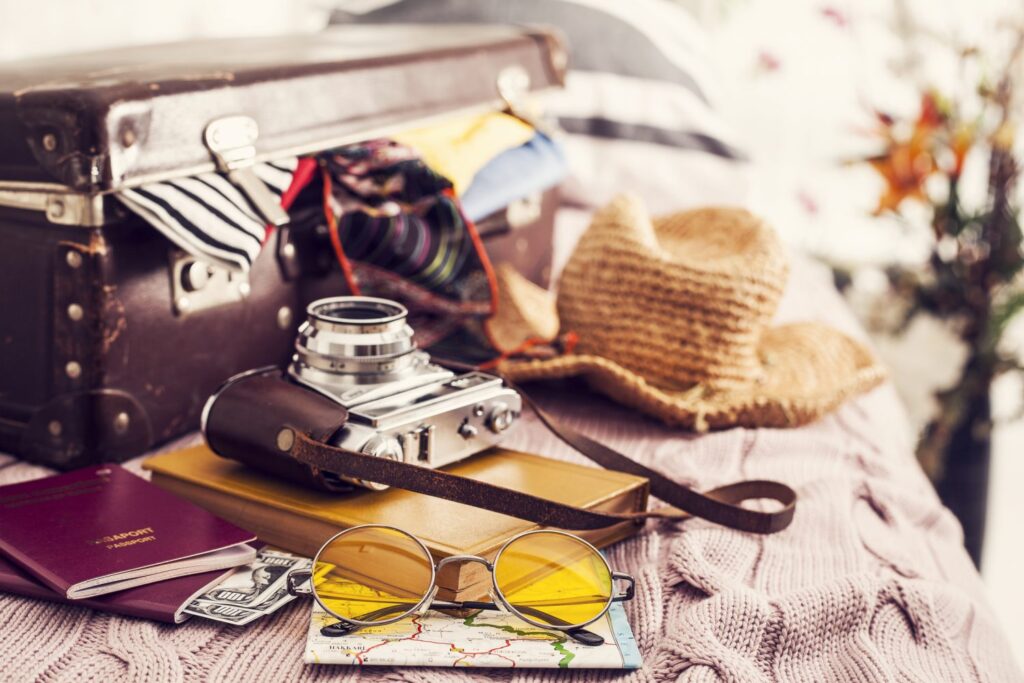 Ready vacation suitcase on bed