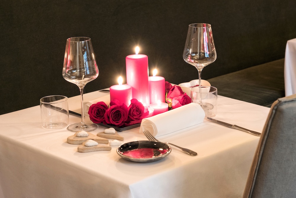 Candlelit table setting for two